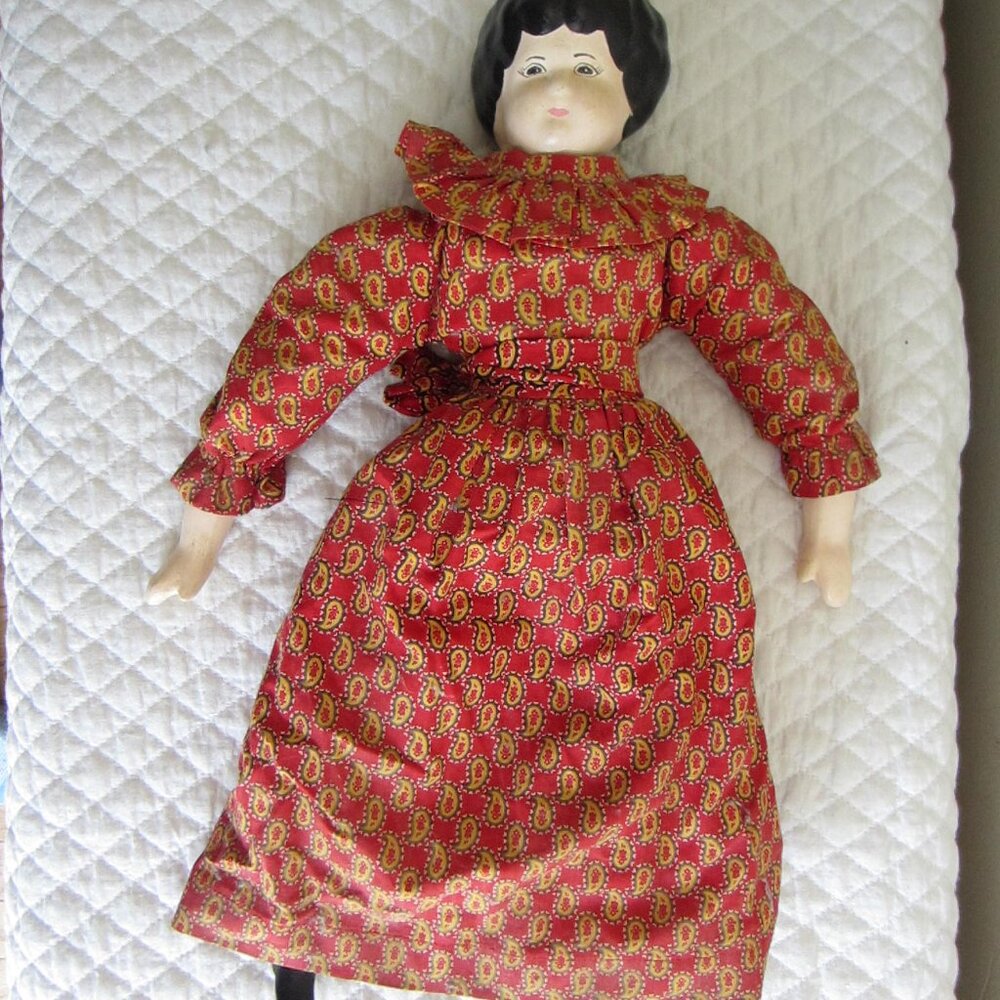 Vntg 18” Doll w/ ceramic head, feet, hands and cloth body